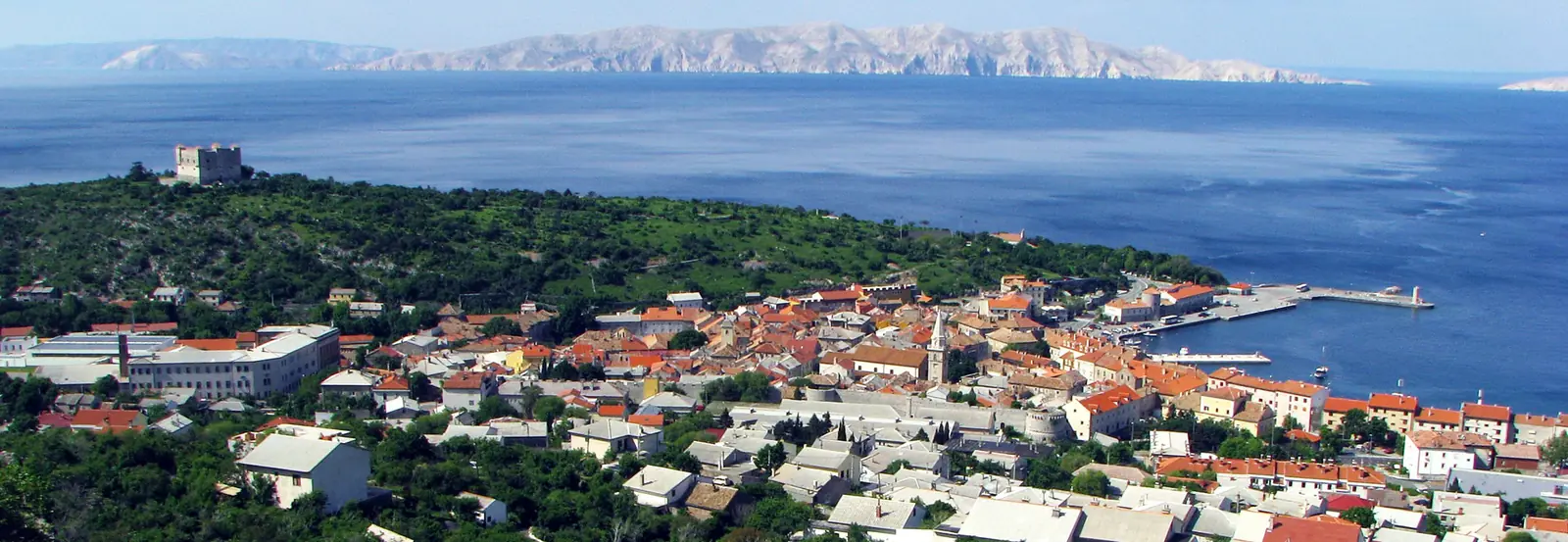 Senj harbour, rooftops, and blue Adriatic water